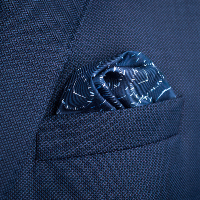 Chronos watch dial design silk pocket square in navy blue by Otway & Orford folded in top pocket